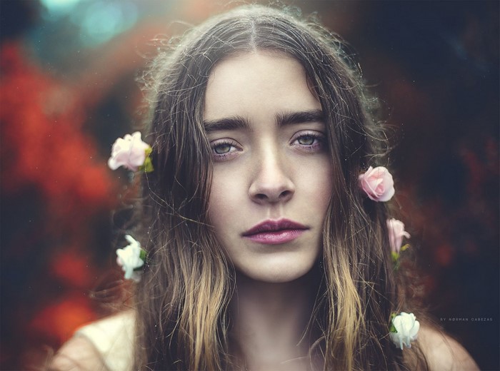 Portrait of a young woman with flowers in her hair