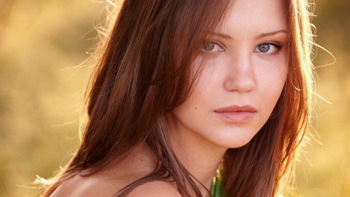 Portrait of a Redhead Woman with Gray Eyes