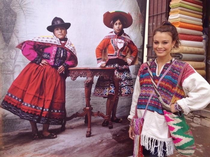 Nathalie Kelley with women in traditional clothing