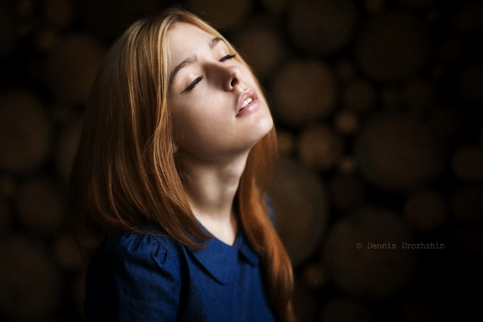 Portrait of a young woman with closed eyes