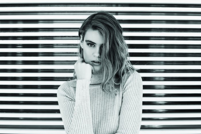 Monochrome portrait of a woman in a turtleneck