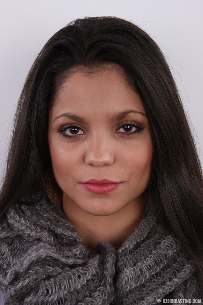 Woman with long dark hair and brown eyes