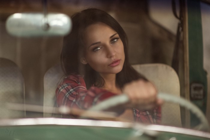 Angelina Petrova in a car by Stephan Hainzl