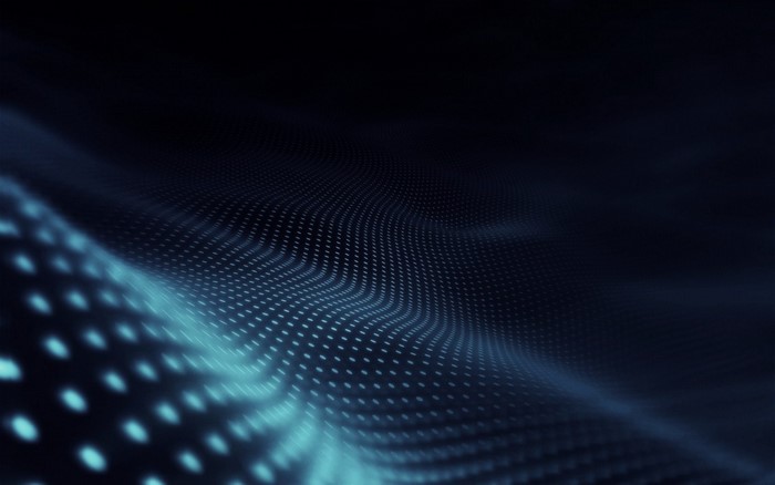 Abstract blue glowing dots forming a wave pattern