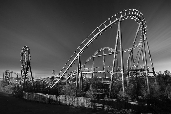 Abandoned roller coaster at night