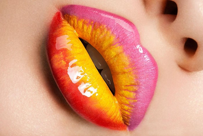 Close up of lips with colorful ombre lipstick
