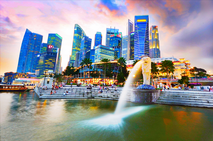 Singapore skyline with Merlion fountain at dusk
