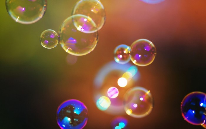 Colorful bubbles with reflections and bokeh lights