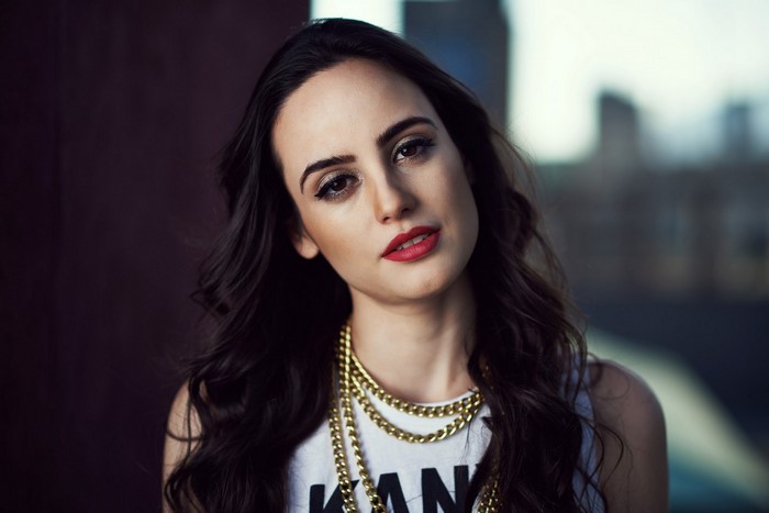 Elegant Portrait of a Woman with Red Lipstick and Gold Chains
