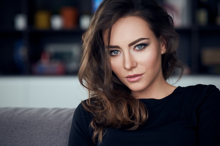 Portrait of a Woman with Blue Eyes and Brown Hair