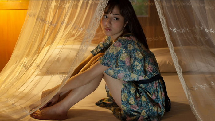 Yumi Sugimoto Sitting in Floral Dress