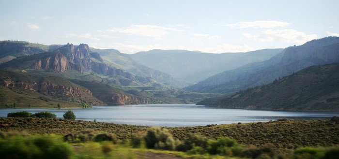 Mountain valley with a lake and rolling hills