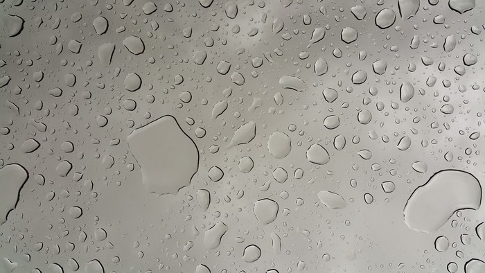 Water drops on a glass surface