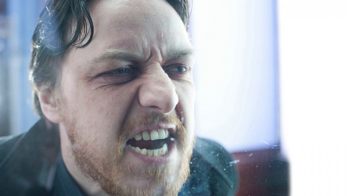 James McAvoy as a man with a beard and mustache