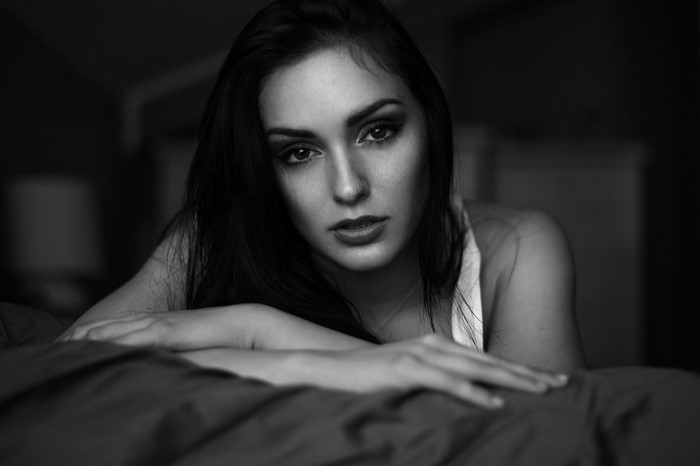Monochrome portrait of a woman with long dark hair
