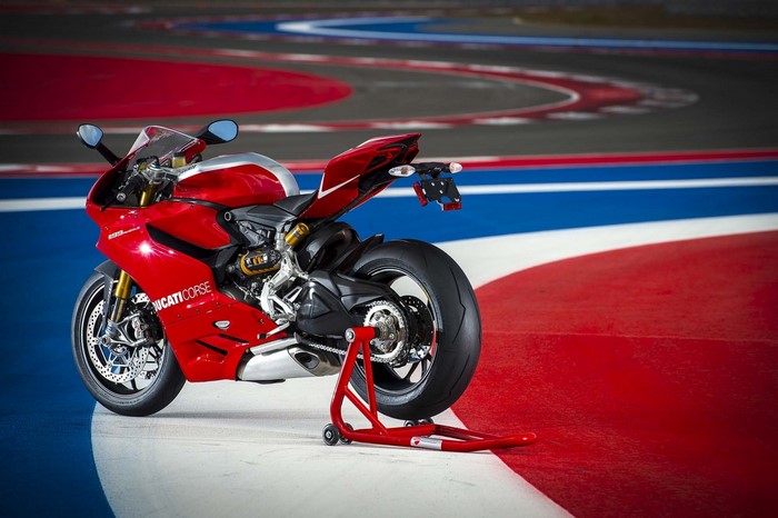Red Ducati Corse Superbike Motorcycle on Race Track