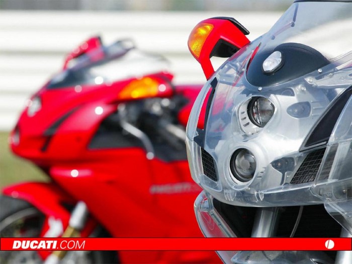Two Ducati motorcycles on a track