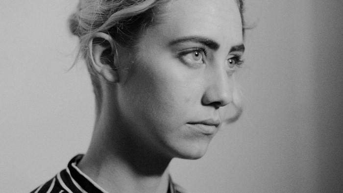 Monochrome portrait of a woman looking away