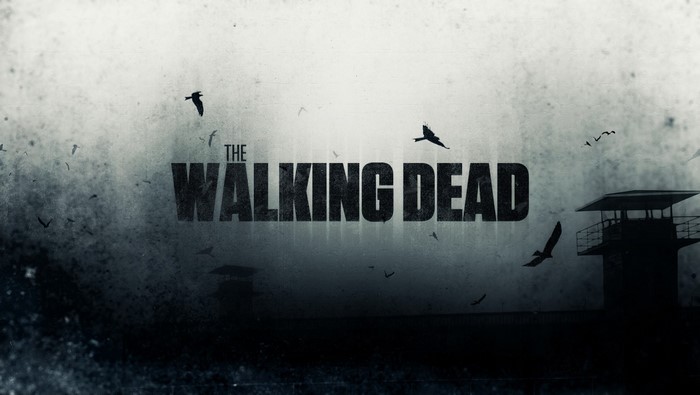 The Walking Dead title card with birds and prison tower