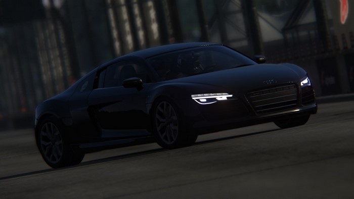 Black Audi R8 driving at night