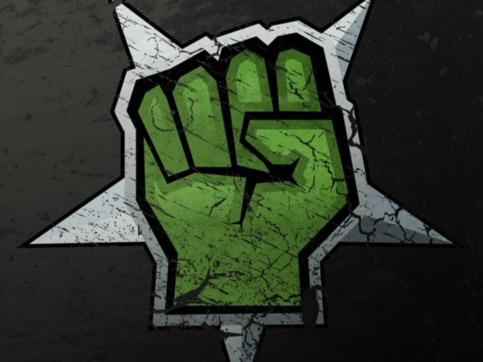 Green fist breaking through a cracked star