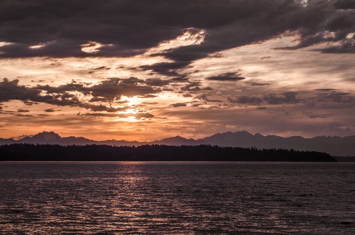 Sunset over mountains and sea