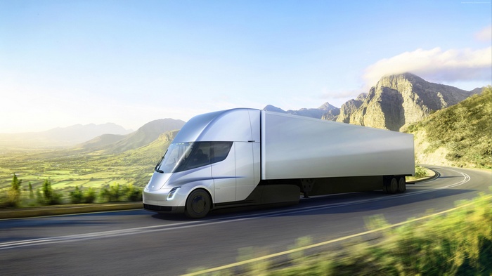 Tesla Semi Truck driving on a mountain road
