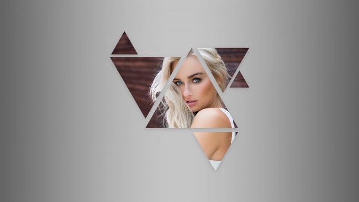 Woman's face fragmented by geometric shapes