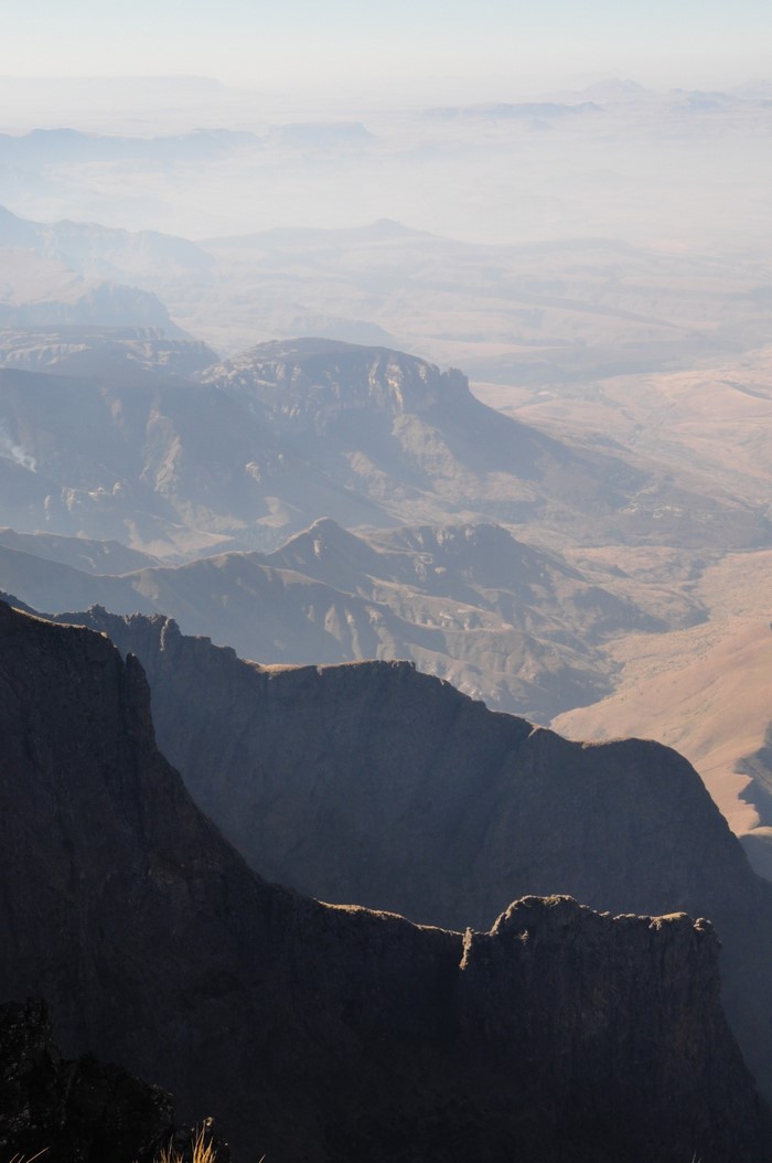 Mountain range with valleys and atmospheric haze