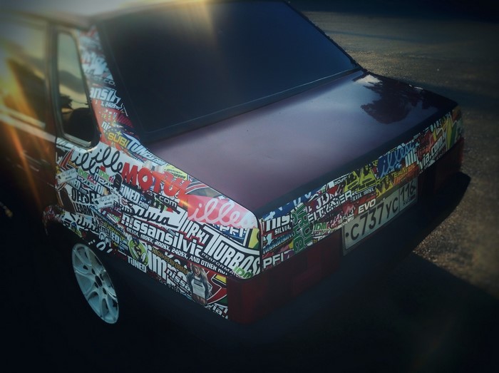Car with JDM stickers and license plate C737YC116