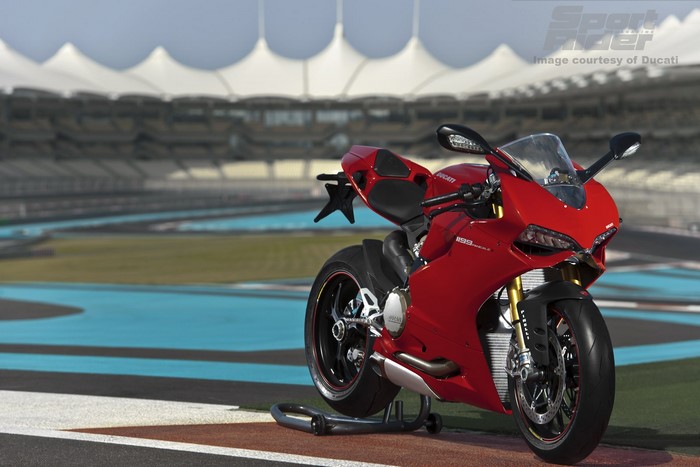 Red Ducati Panigale 1199 motorcycle on a race track