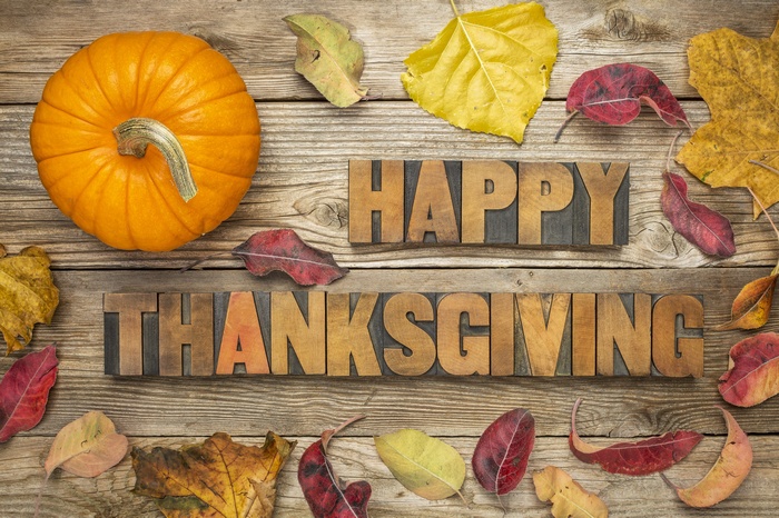 Happy Thanksgiving wooden letters with pumpkin and leaves
