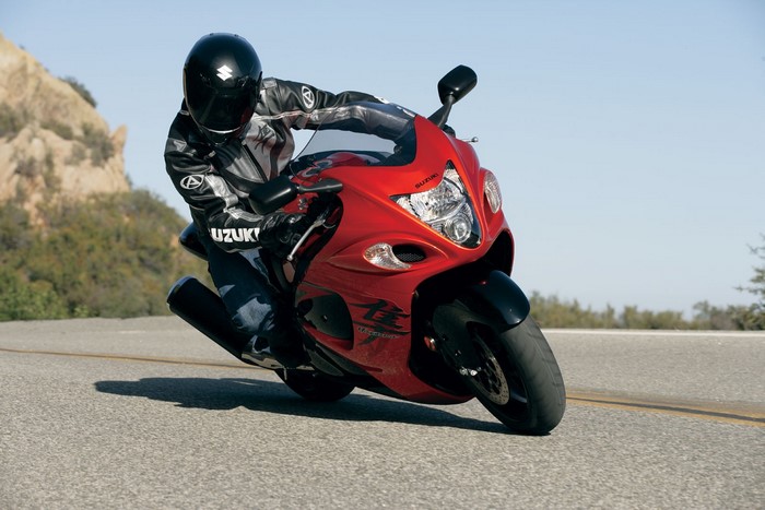 Suzuki Hayabusa motorcycle with rider on a road