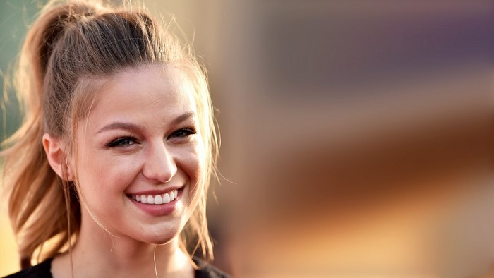 Melissa Benoist smiling with her hair in a ponytail