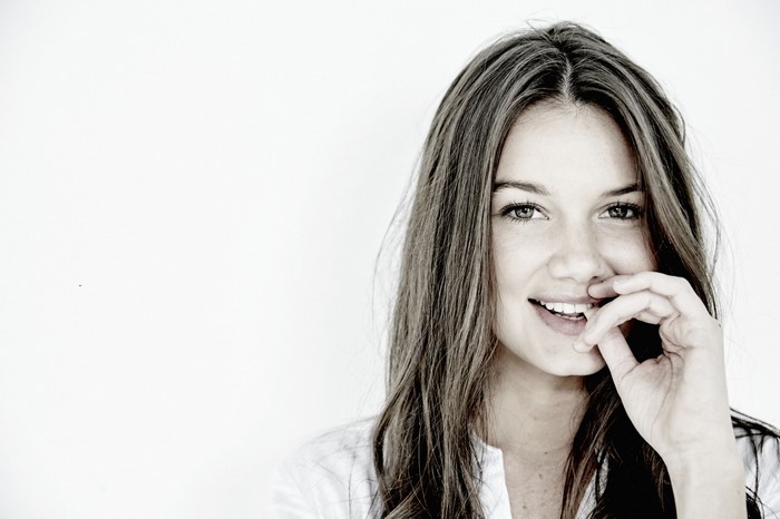 Monochrome portrait of Hailey Outland smiling