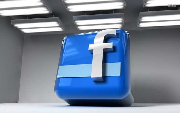 Facebook logo in a modern room with lights