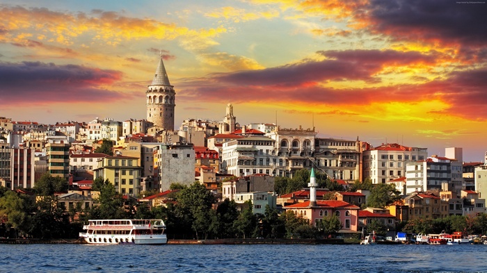 Galata Tower and Istanbul skyline at sunrise