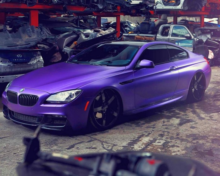 Purple BMW 6 Series Coupe in junkyard