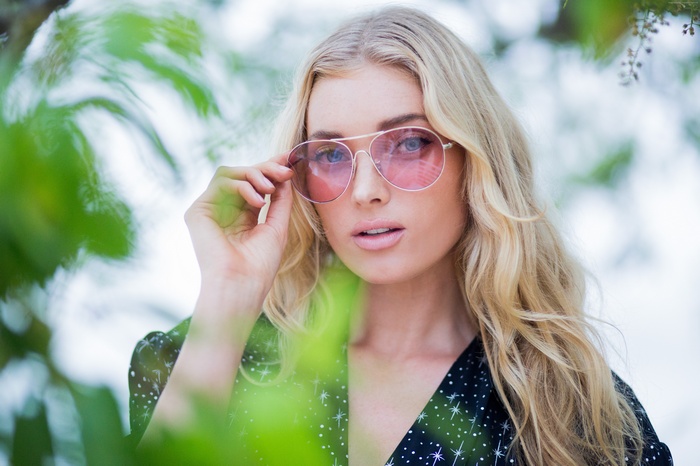 Elsa Hosk wearing pink sunglasses