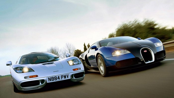 McLaren F1 and Bugatti Veyron on a road