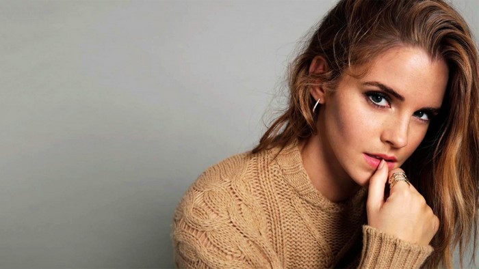 Emma Watson close-up portrait in brown sweater