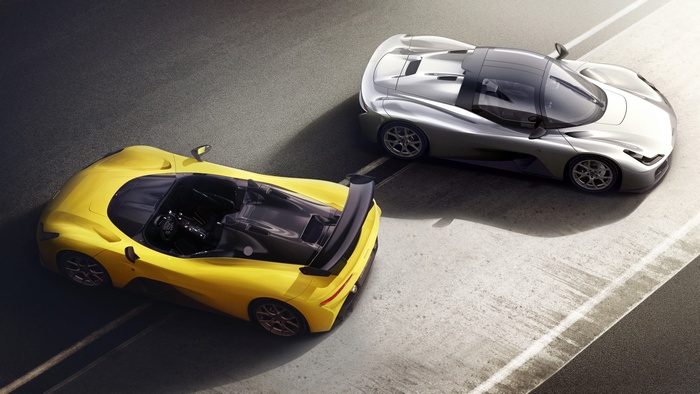 Two Dallara Stradale sports cars on a road