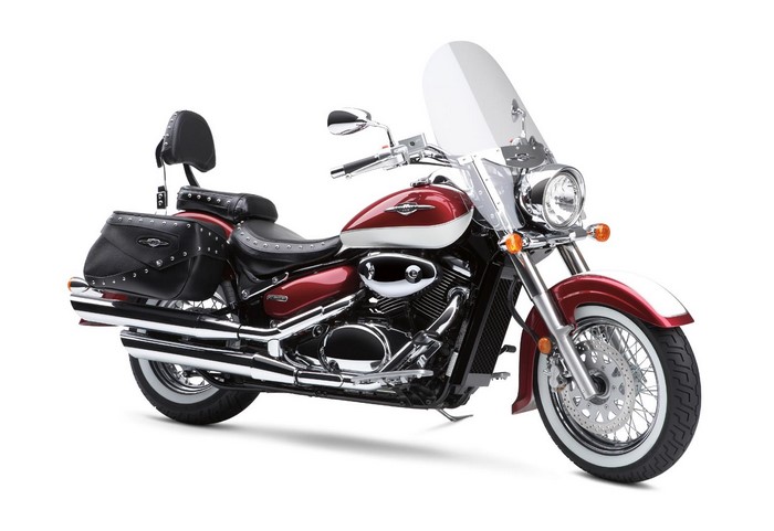 Red and white Suzuki cruiser motorcycle with saddlebags