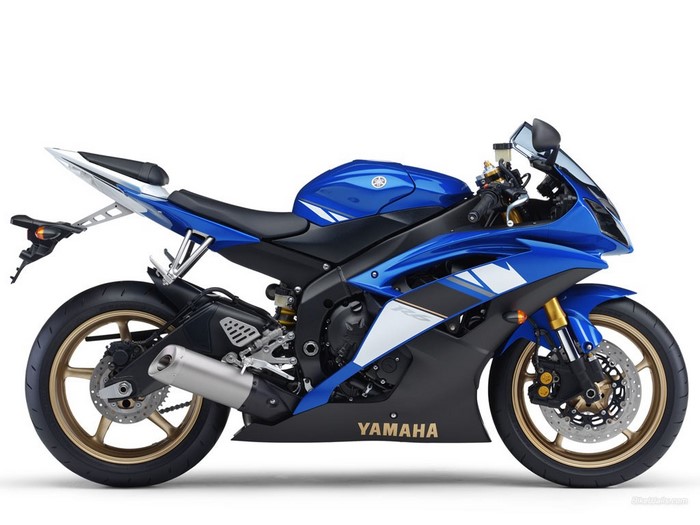 Blue Yamaha R6 motorcycle on a white background