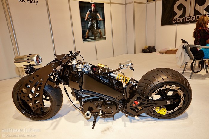 Custom black motorcycle with unique front wheel design
