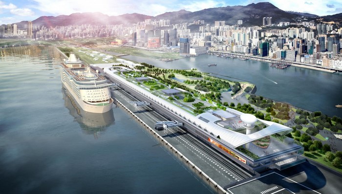 Cruise ship docked at a modern port with a cityscape background