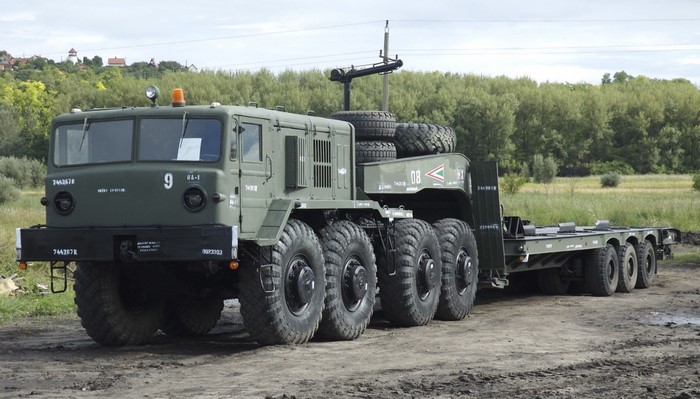 Military truck with trailer and spare tires