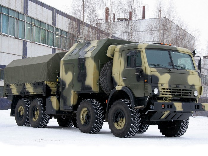 Kamaz military truck with camouflage in the snow