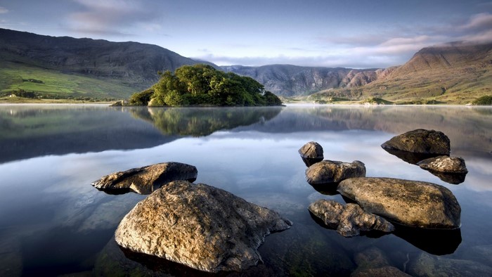 Lake with island and mountains