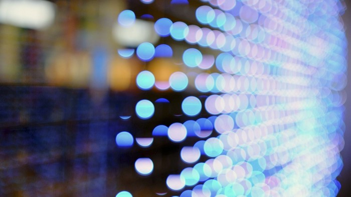 Abstract bokeh lights in blue and white